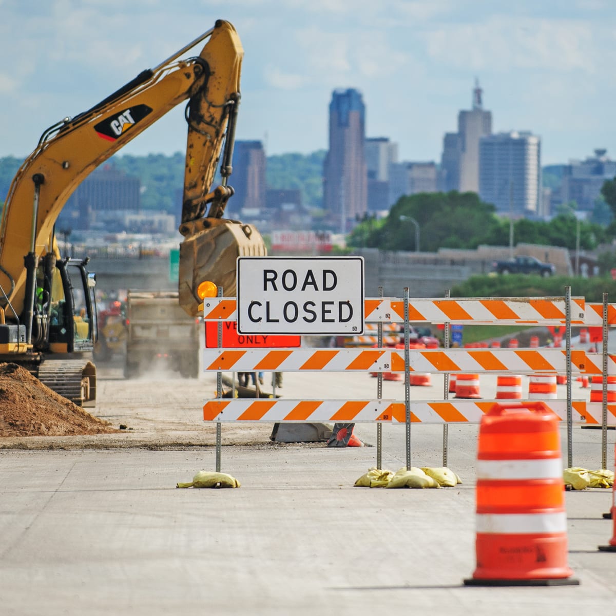 road closed sign on road construction site in the city
